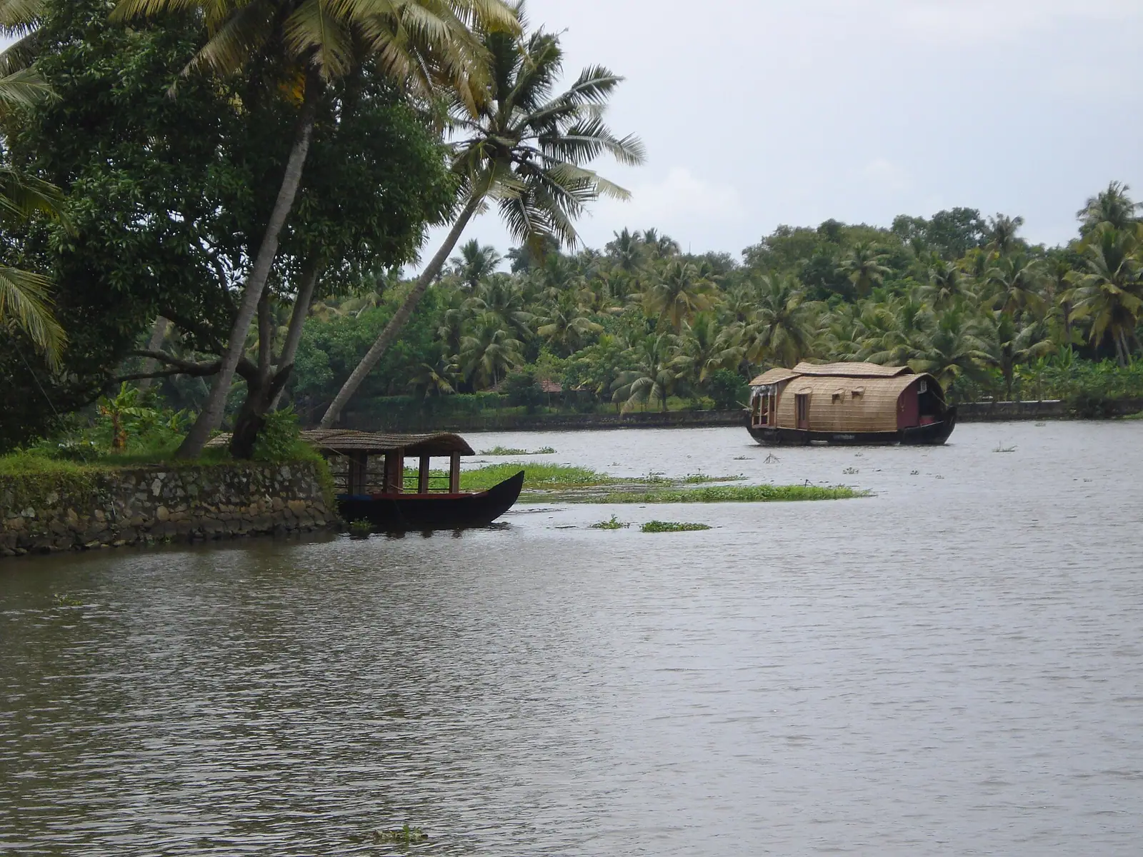A thatched kettuvallam houseboat on the Alappuzha backwaters in Kerala