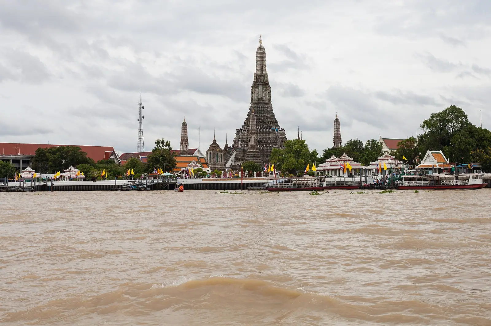 The porcelain-studded spire of Wat Arun on the Chao Phraya river, Bangkok