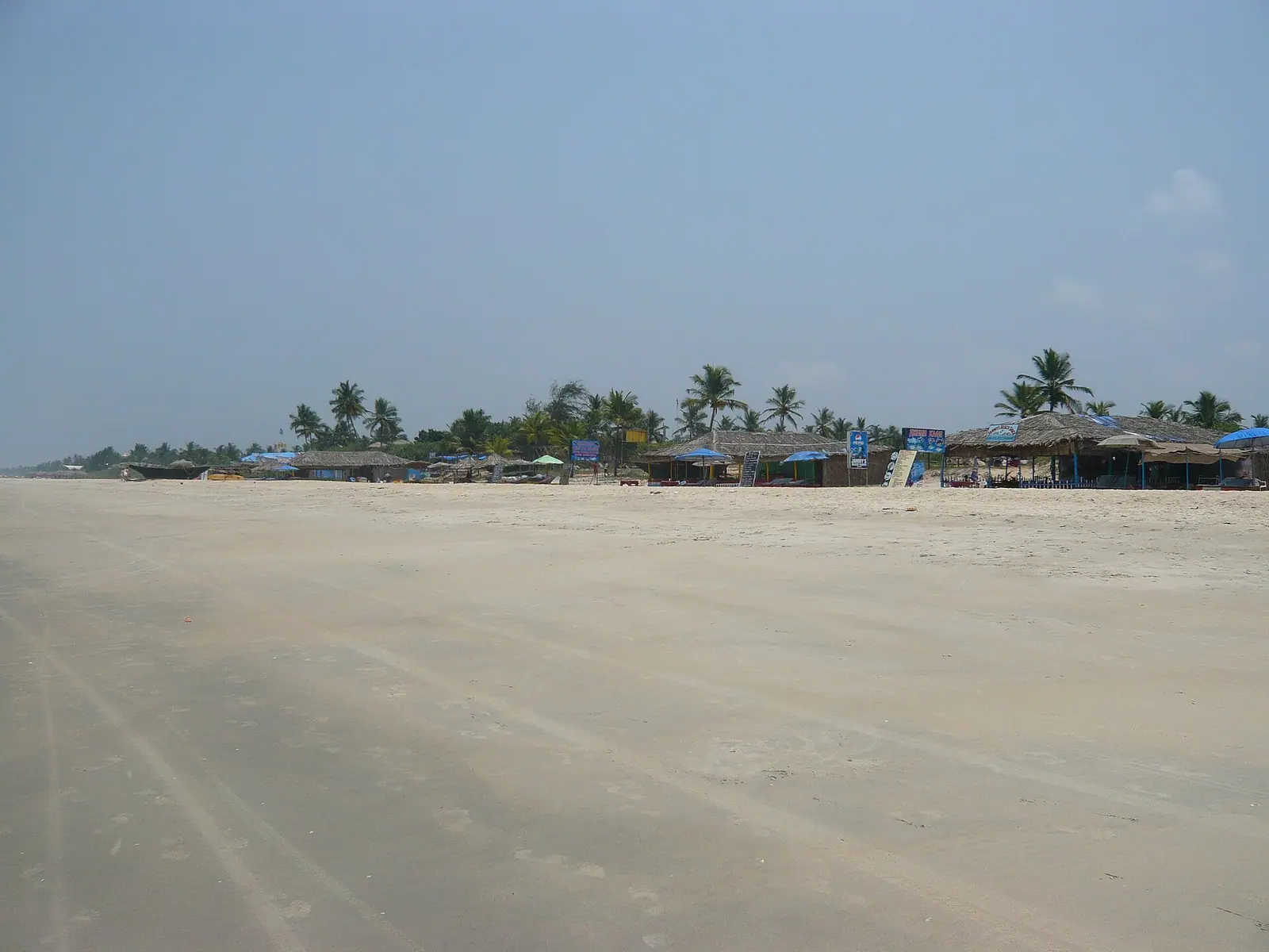 A wide, gently shelving beach in Goa, popular with families