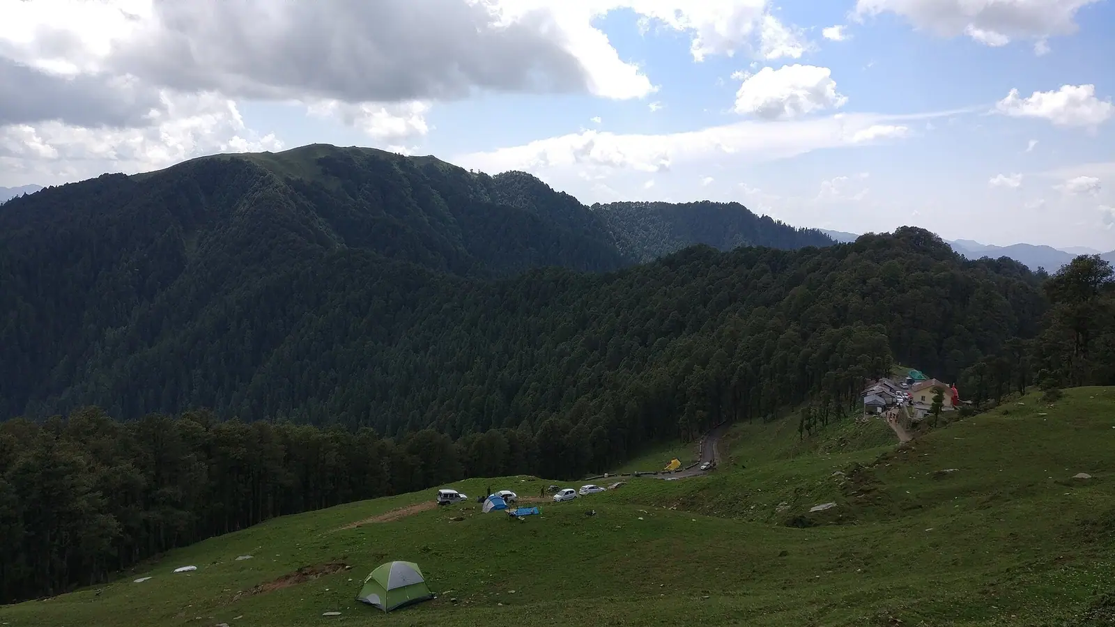 The road over Jalori Pass with oak forest on the ridges, Himachal Pradesh