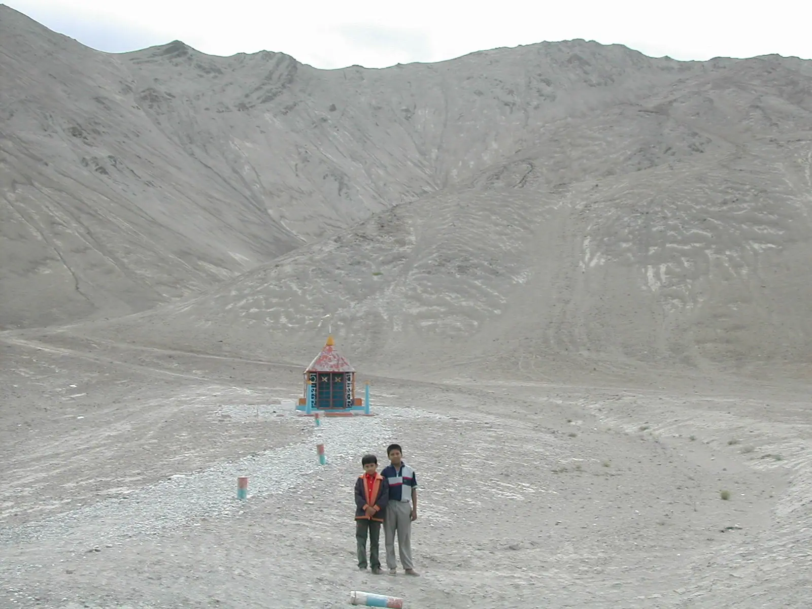 The empty highway running through barren hills near Magnetic Hill in Ladakh