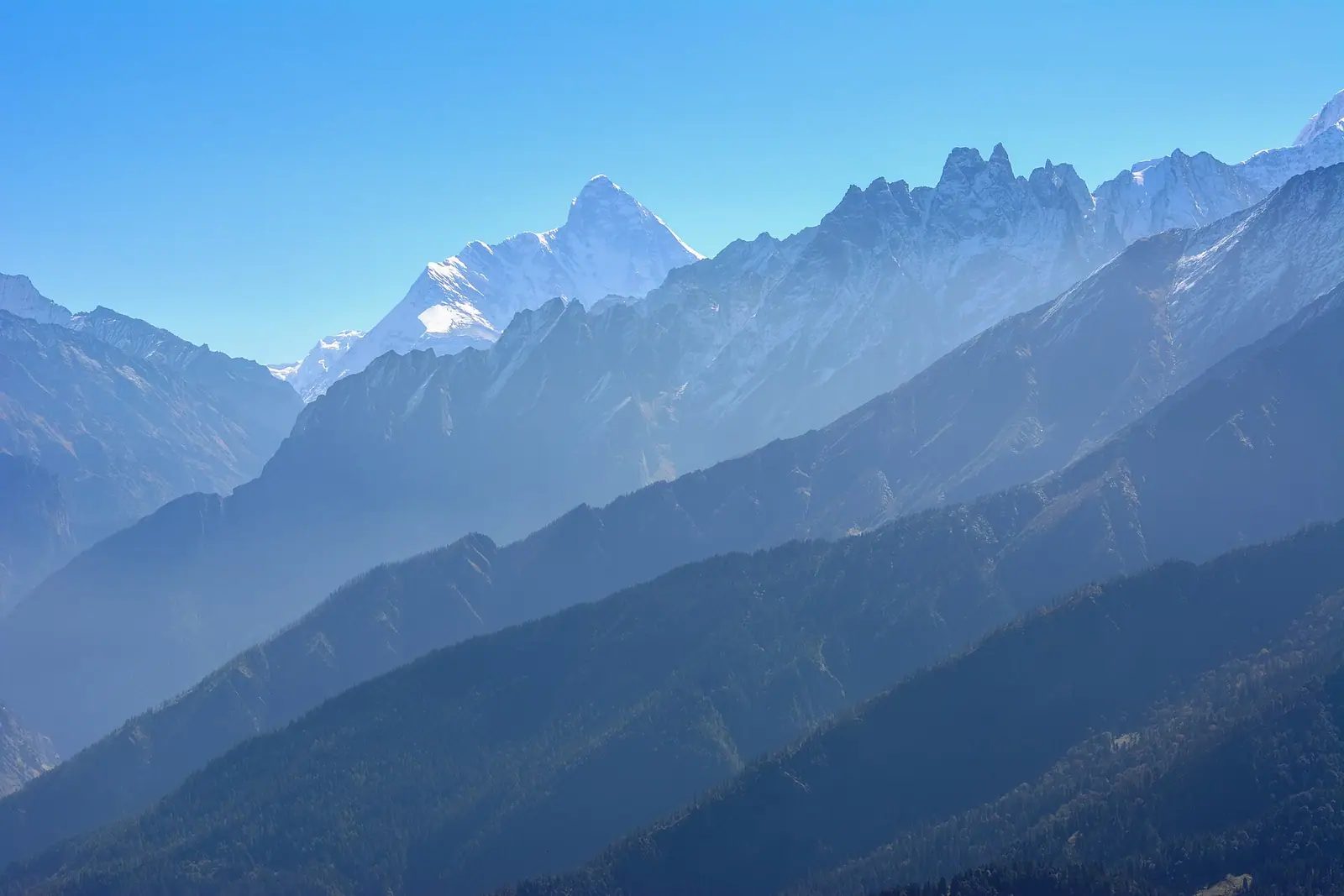 The summit of Nanda Devi seen across the ranges from Auli, Uttarakhand