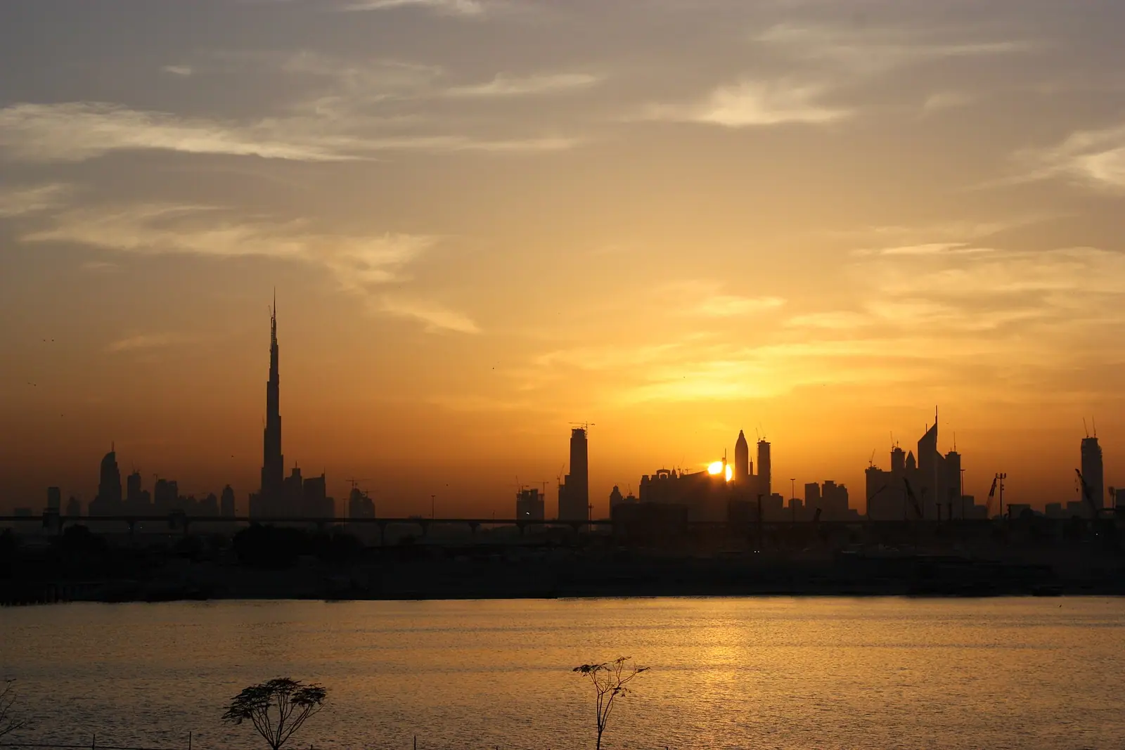 The towers of Dubai seen across the water, United Arab Emirates