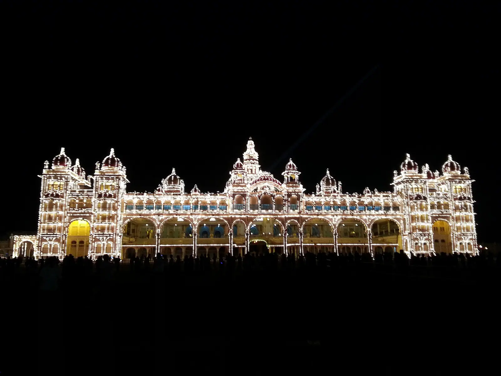 Mysore Palace outlined in lights after dark, Karnataka